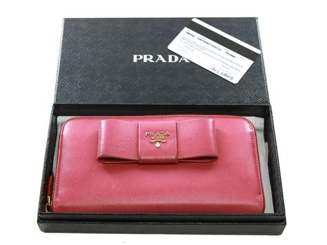 prada ribbon logo pink leather zip around|Authentic Prada Saffiano pink leather ribbon zip around wallet.